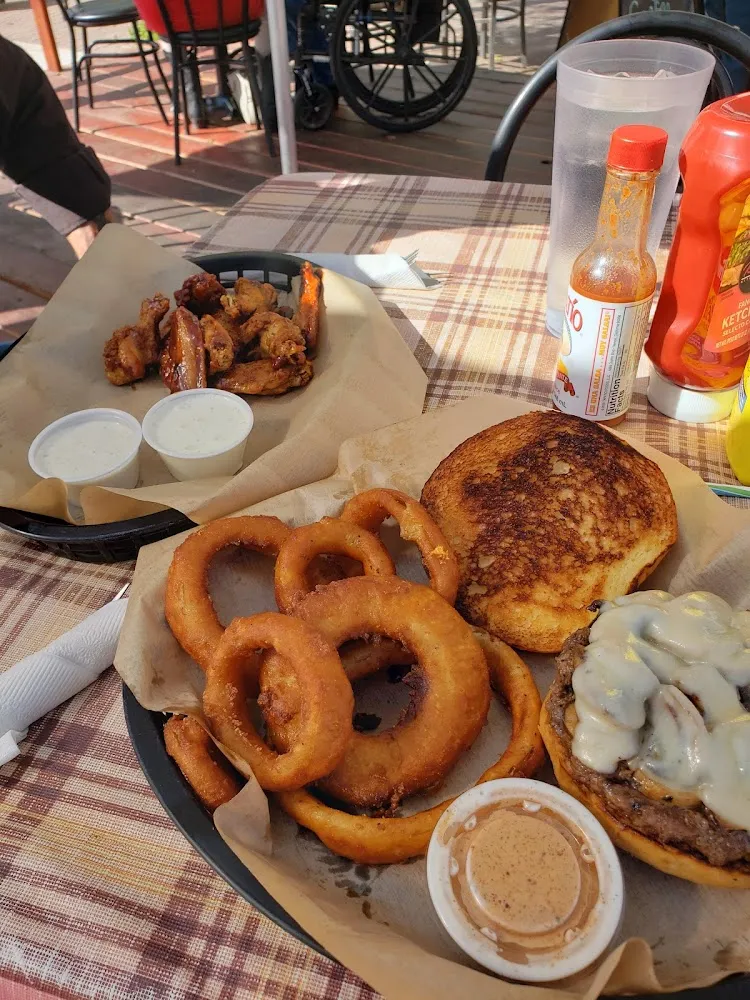 Mushroom Swiss Burger Onion Rings and Wings